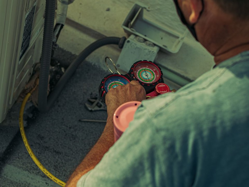 Technician checking treatment equipment - Integrated Pest Management Sydney