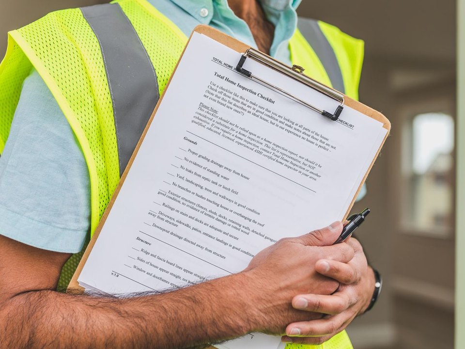 Inspector completing a property report - Pre-Purchase Pest Inspection Sydney