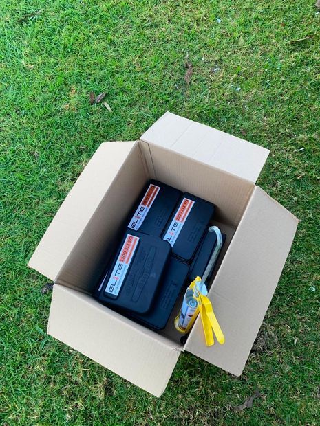 Elite Pest and Termite Solutions branded lockable rodent bait stations and keys ready for installation
