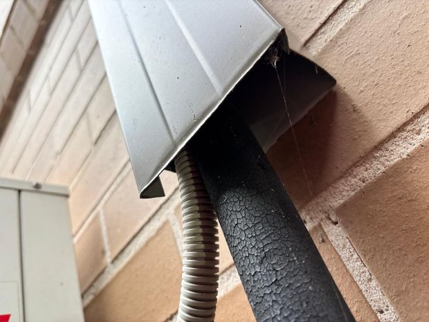 The gap around the air-conditioning services leading towards the roof cavity