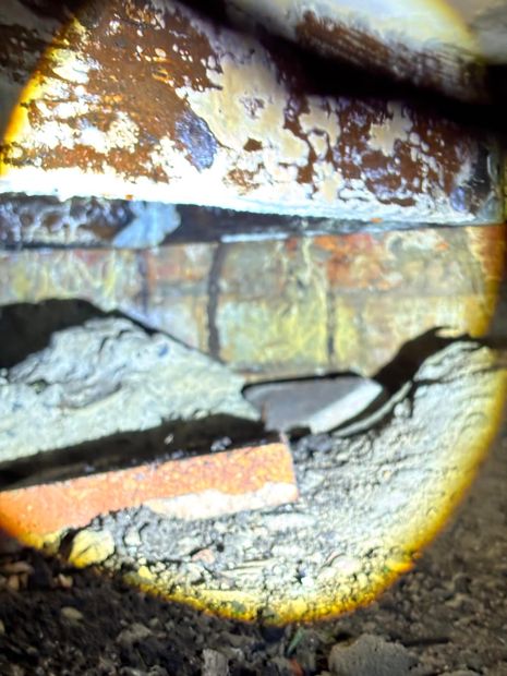 Inspection camera used to check the concealed cavity for live termite activity