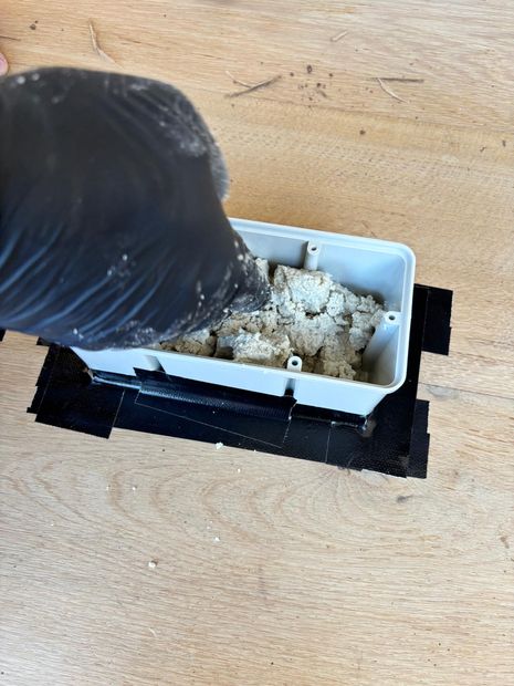 Bait matrix loaded into the station before it is closed and sealed