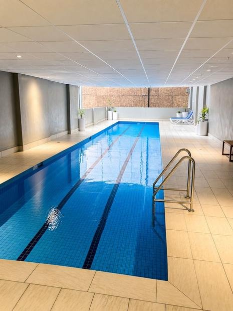 Indoor pool and wet area on a commercial program