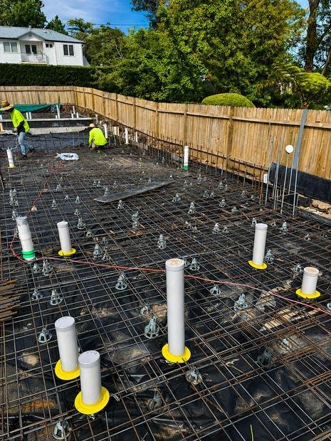 Service penetration collars set out through the reinforcement mesh