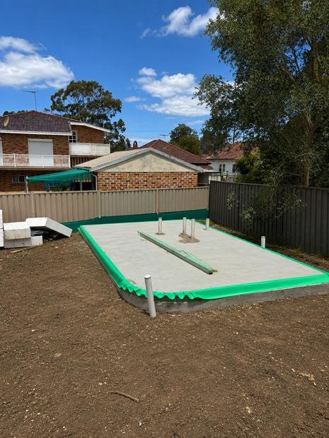 Perimeter barrier and penetration sleeves on a new slab