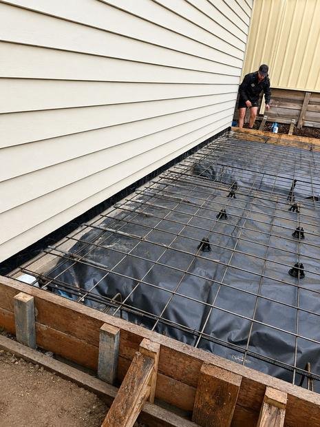 Barrier membrane and mesh installed before the pour