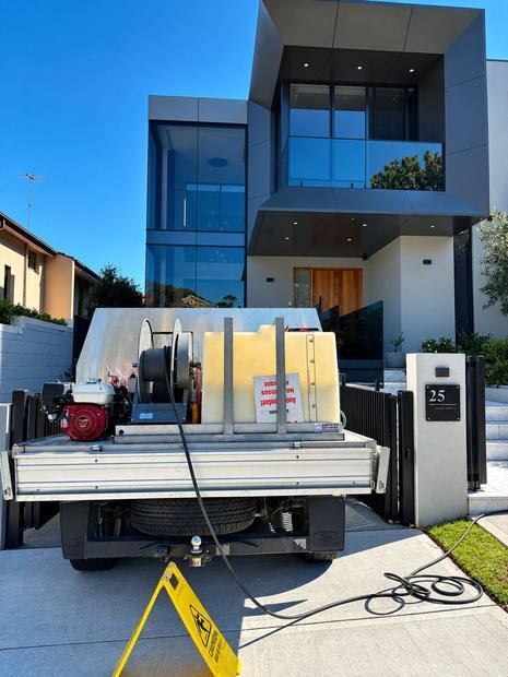 Elite service vehicle and power sprayer at a Sydney home