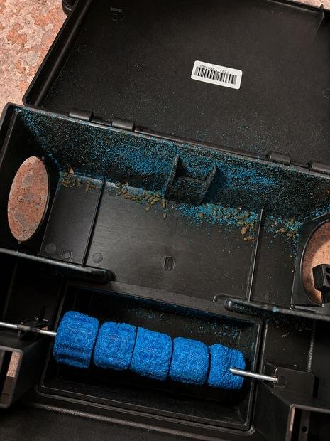 Bait station opened during a routine service visit
