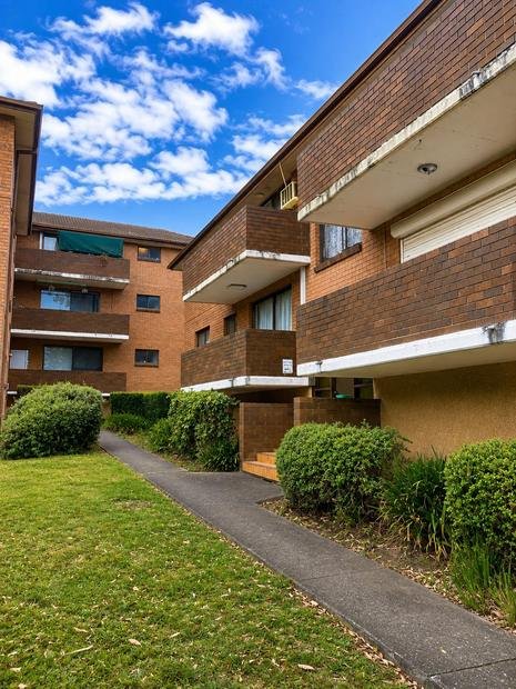 Walk-up apartment block under a strata pest program