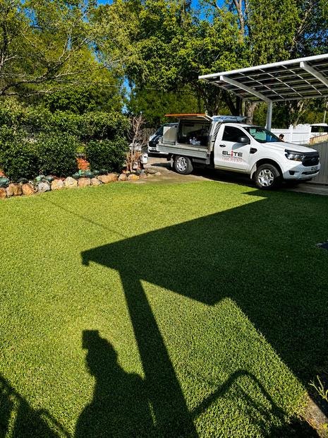 Elite technician on site at a large residential property