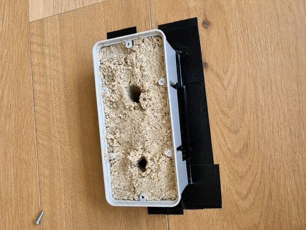 Termite bait station opened for inspection and refill